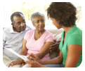 senior couple having a discussion with a physician