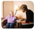 senior woman having a discussion with a physician